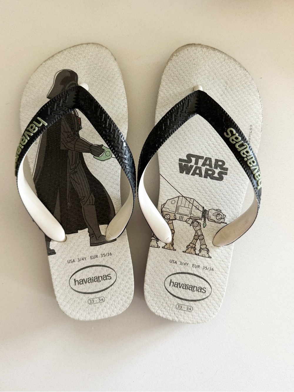 Havaianas Kids Star Wars Graphic Flip Flops in White and Black